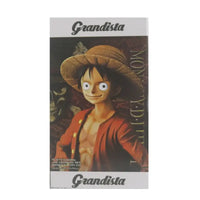 A 28cm One Piece Luffy Figure made of PVC, featuring three interchangeable face plates showing confident and smiley expressions for custom display.