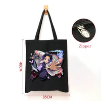 A durable Demon Slayer Canvas Bag featuring Kamado Nezuko and Tanjiro anime graphics, designed as a zipper tote for students and shoppers.