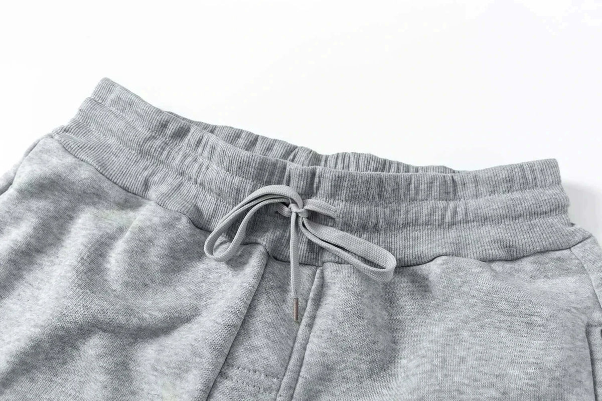 Close-up of One Piece Luffy Sweatpants showing the waistband and drawstring detail in gray.