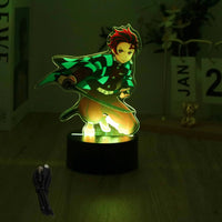 A glowing Demon Slayer 3D Lamp featuring an acrylic Tanjiro and Nezuko figure design, illuminated in blue LED light for bedroom decor.