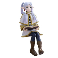 A high-quality 14cm Frieren Anime Figure sitting down, functioning as a noodle stopper and desktop decoration.