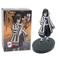 A highly detailed 16cm Demon Slayer Anime Figure made of premium PVC, showcasing Kamado Tanjiro in a dynamic warrior action pose for desktop decoration.