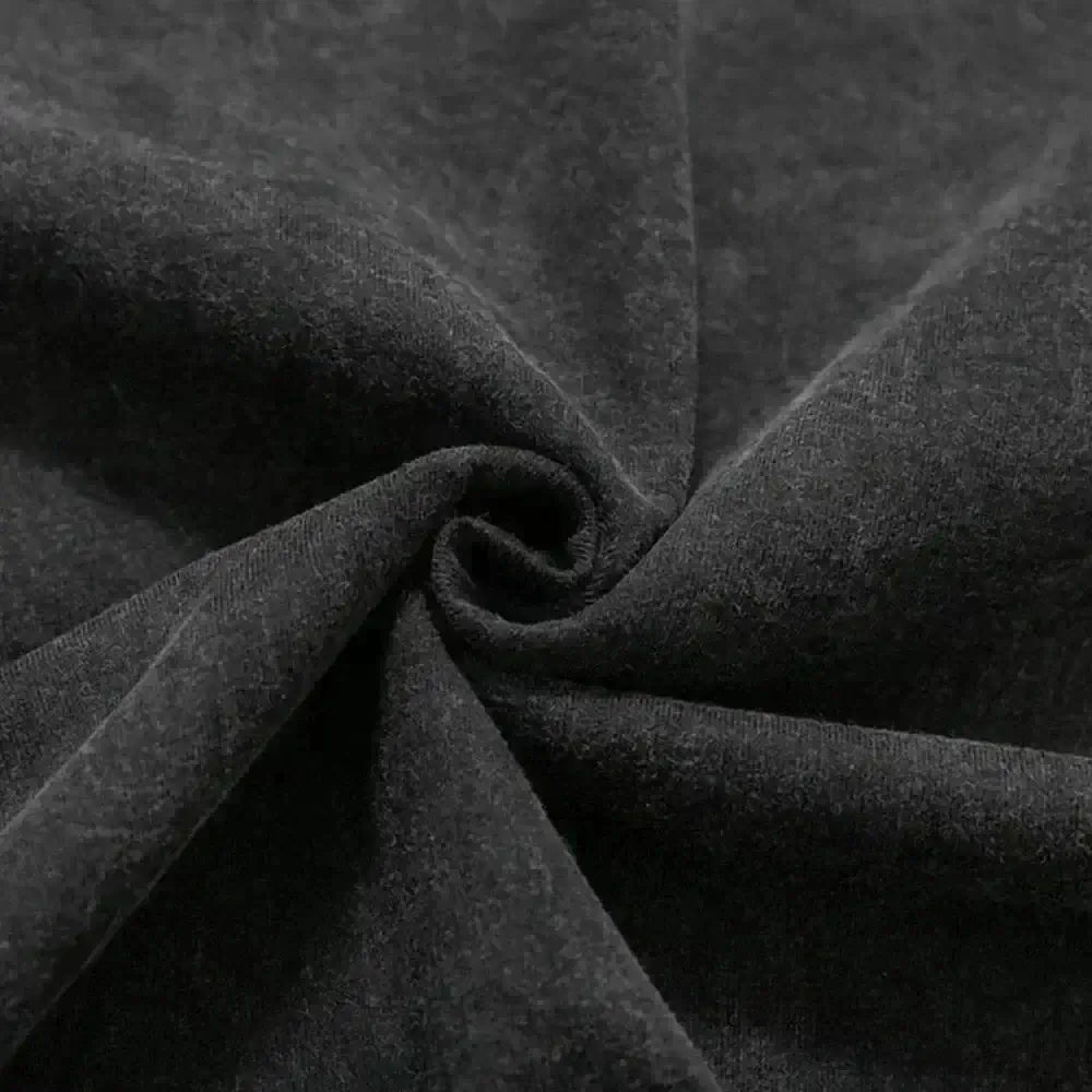 Close-up view of the vintage washed fabric of a Fullmetal Alchemist Vintage Washed Hip Hop T-Shirt.