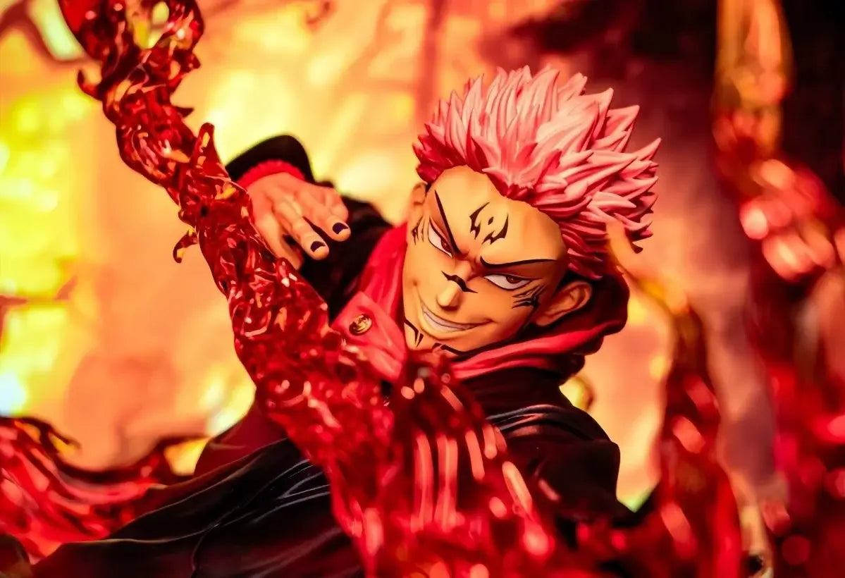 A highly detailed Ryomen Sukuna Figure made of premium PVC, showcasing the Jujutsu Kaisen King of Curses in an extreme battle stance for desktop decoration.