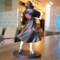 A high-quality Uchiha Itachi Action Figure from Naruto Shippuden, featuring the Akatsuki Organization cloak and GK PVC dress-up design elements.