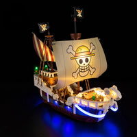 A Going Merry LED Light Set illuminating the 75639 pirate ship building block model, showcasing glowing cabins and deck lights.
