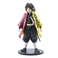 A highly detailed 16cm Demon Slayer Anime Figure made of premium PVC, showcasing Kamado Tanjiro in a dynamic warrior action pose for desktop decoration.