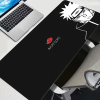A high-quality Akatsuki Naruto Mouse Pad featuring the iconic red clouds, designed as a large gaming desk mat for keyboard and mouse setups.
