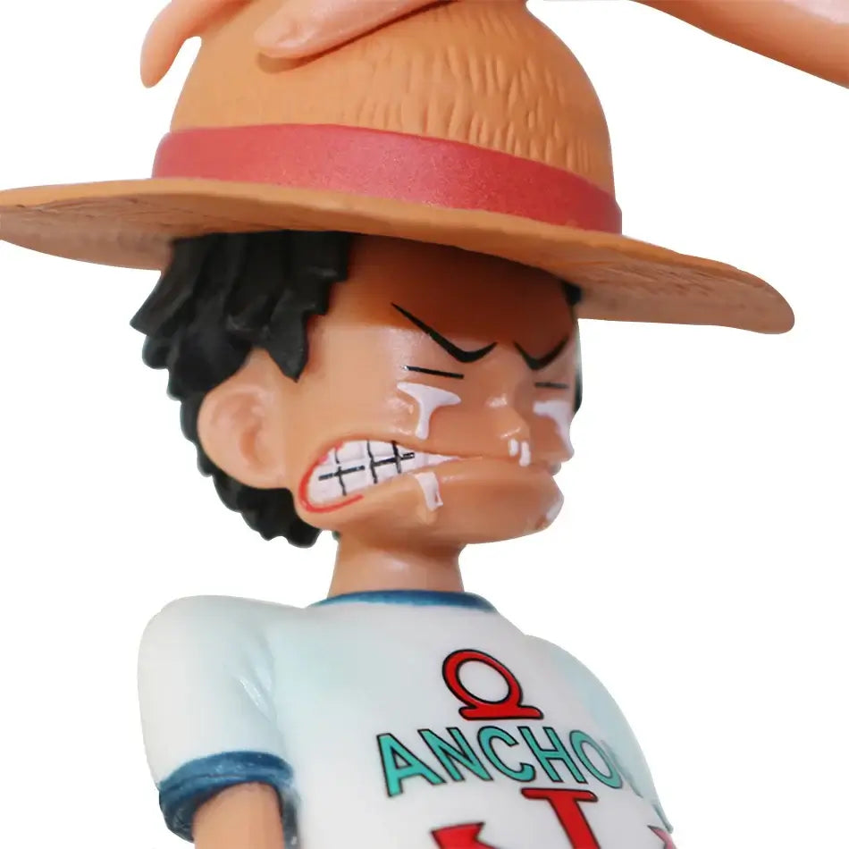 A highly detailed 18cm Shanks Luffy Action Figure made of premium PVC, capturing the emotional Straw Hat promise from the One Piece anime.