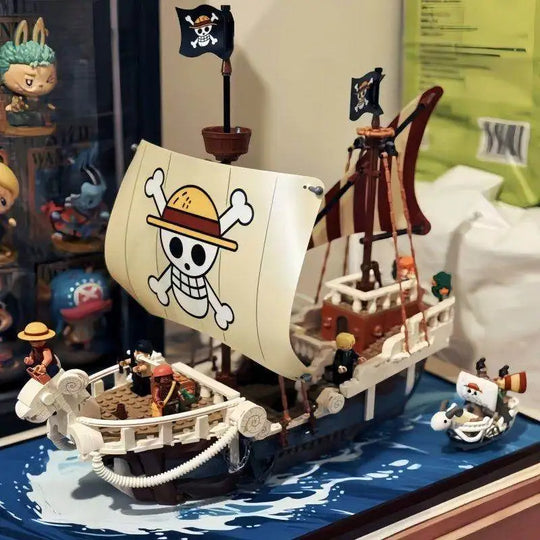 A detailed One Piece Going Merry Building Blocks set featuring the Straw Hat Pirate Ship, designed as an assembly model toy for children and collectors.