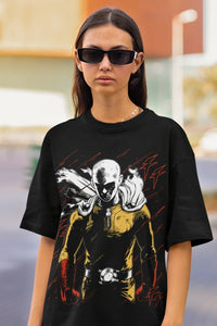 A black Saitama T-Shirt featuring a gritty horror manga graphic of the One Punch Man protagonist, styled as unisex streetwear.