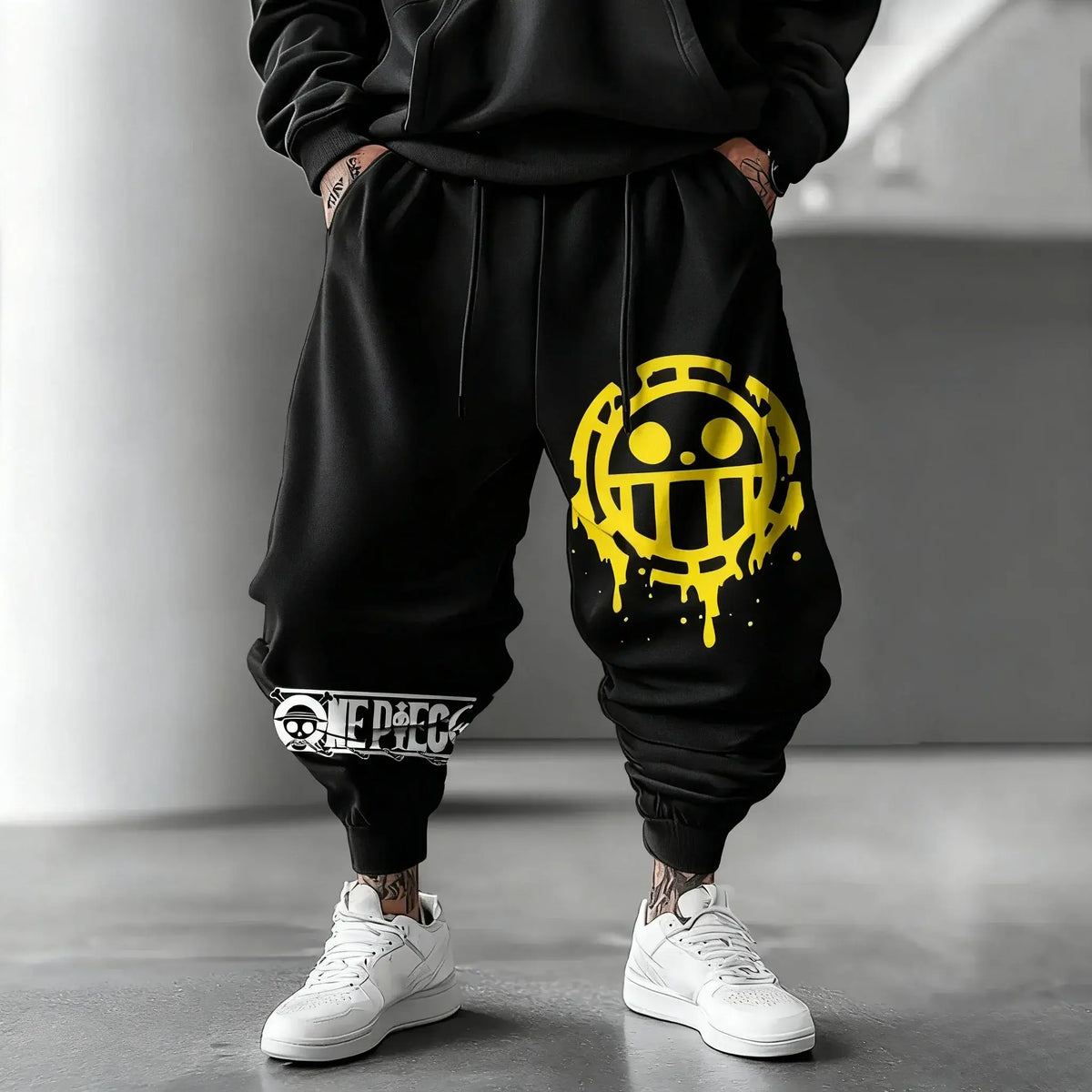 Trendy One Piece Graphic Joggers featuring anime character prints, designed as casual Y2K streetwear sweatpants for men and women.