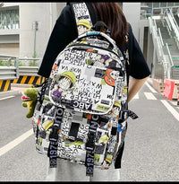 A high-capacity One Piece Luffy Backpack featuring a vibrant graffiti print of Monkey D. Luffy, designed as a durable school bag for middle and high students.