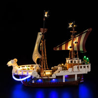 A Going Merry LED Light Set illuminating the 75639 pirate ship building block model, showcasing glowing cabins and deck lights.