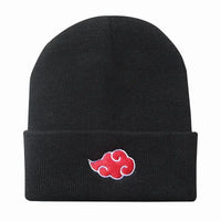 A black knitted Akatsuki Beanie featuring the red cloud embroidery symbol, designed as a warm unisex winter hat for men and women.