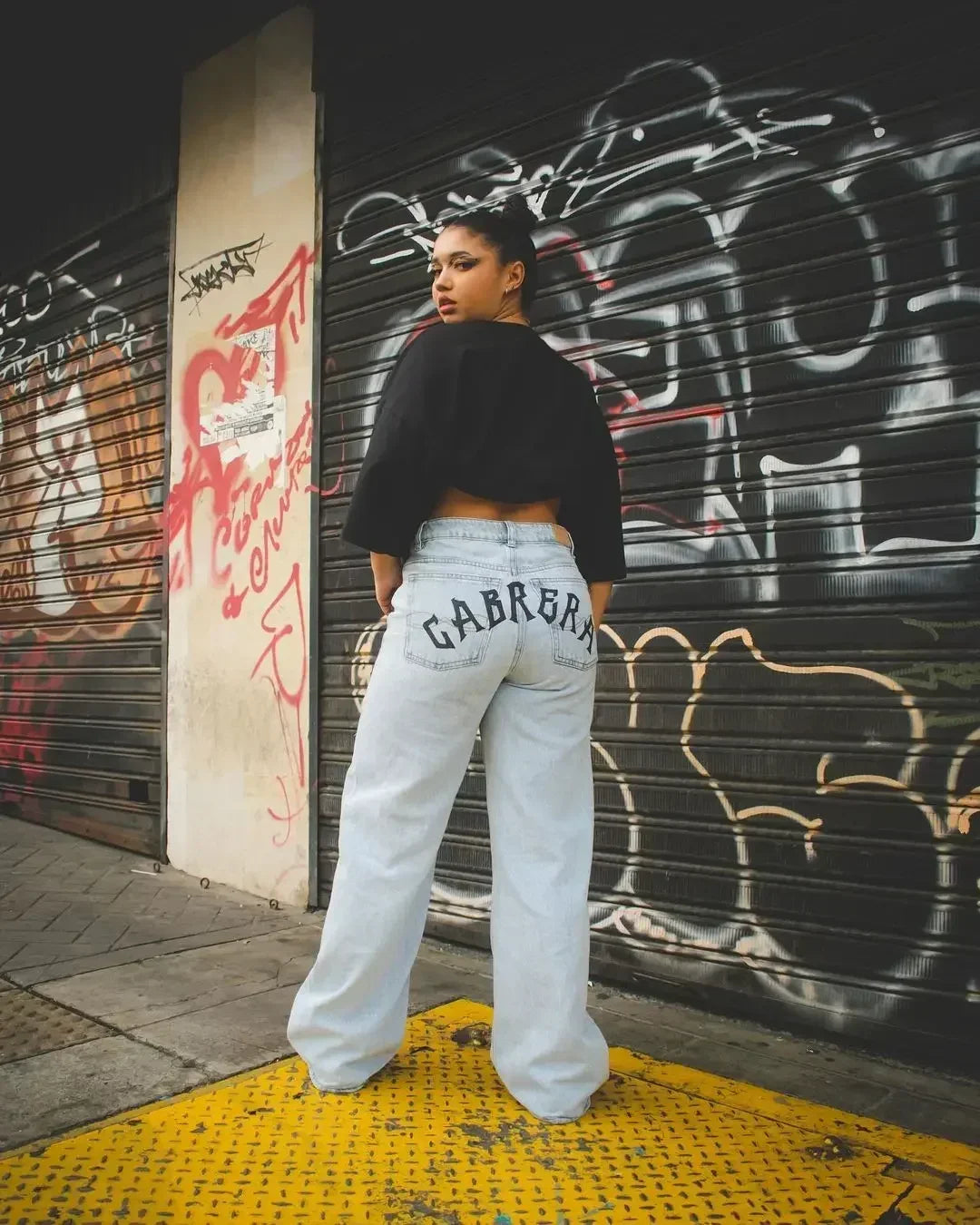 Trendy Y2K Anime Baggy Jeans featuring a Harajuku graphic print pattern, designed as high-waisted vintage streetwear for men and women.