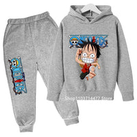 A comfortable One Piece Hoodie Set for kids featuring Monkey D. Luffy anime graphics, including a hoodie and pants 2-piece sports suit.