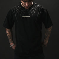 Dark Oversized Cotton Tee Skull Print shown on a model, highlighting the alternative fashion style suitable for men and women's streetwear and gym workouts.
