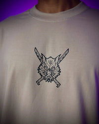 A couple wearing matching oversized Demon Slayer Graphic T Shirts in a hip hop, Y2K streetwear style.