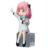 Anya Yor Forger action figure sitting with ice cream, 15CM PVC anime collectible for fans and kids.