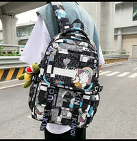 A high-capacity One Piece Luffy Backpack featuring a vibrant graffiti print of Monkey D. Luffy, designed as a durable school bag for middle and high students.