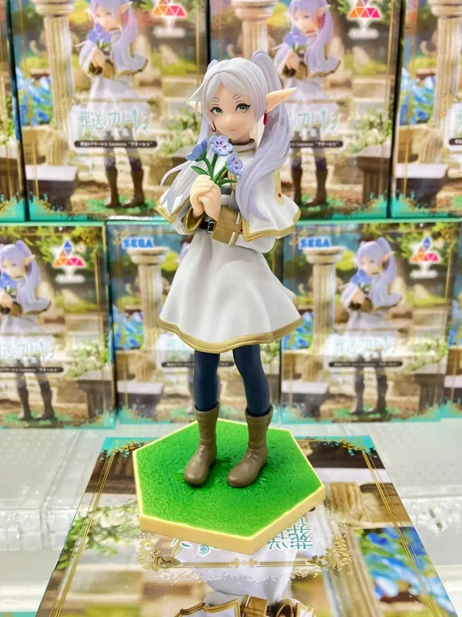 A high-quality 14cm Frieren Anime Figure sitting down, functioning as a noodle stopper and desktop decoration.