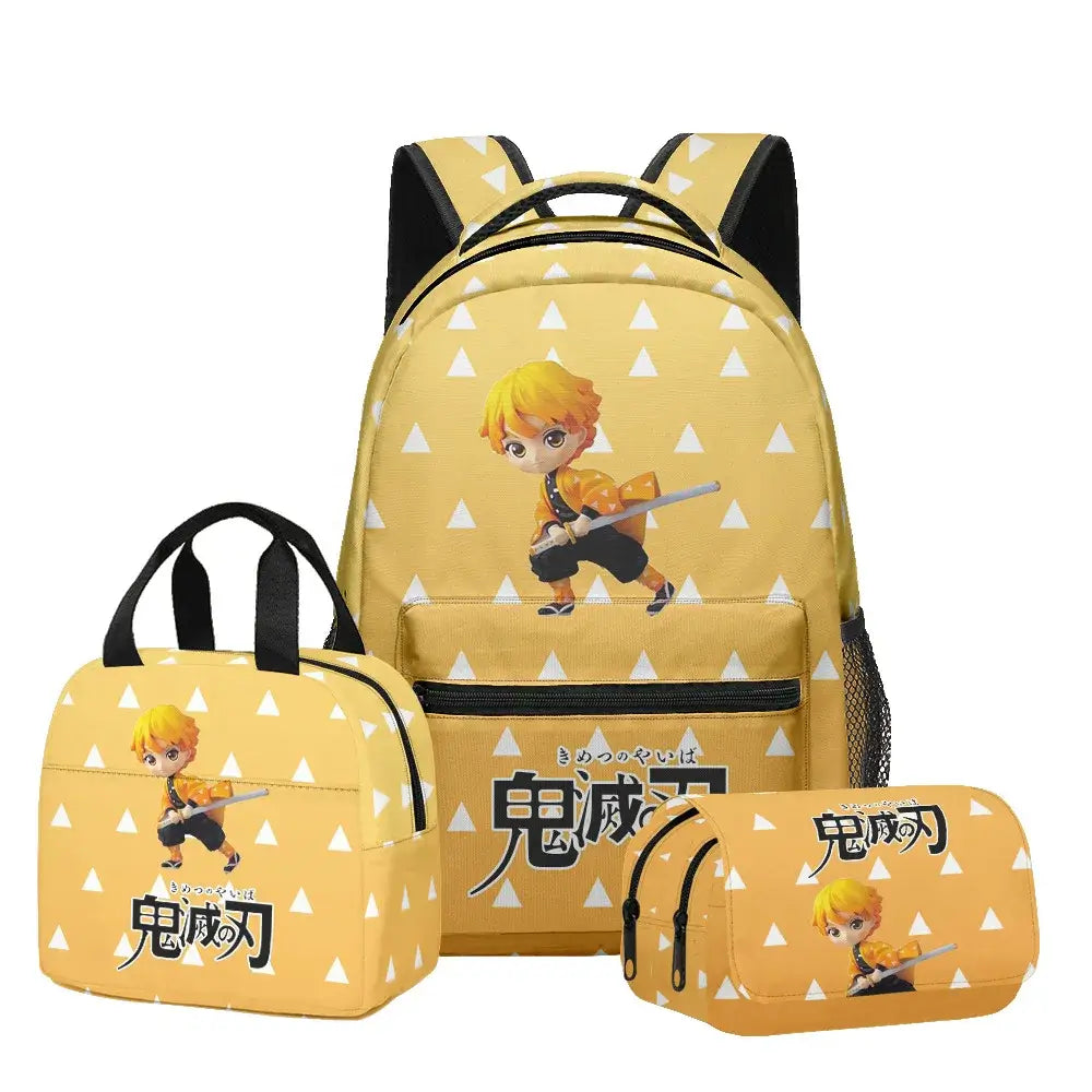 A 3-piece Demon Slayer Backpack Set featuring Tanjiro and Nezuko anime art, including a school bag, lunch box, and pencil case for elementary students.