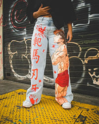 Trendy Y2K Anime Baggy Jeans featuring a Harajuku graphic print pattern, designed as high-waisted vintage streetwear for men and women.