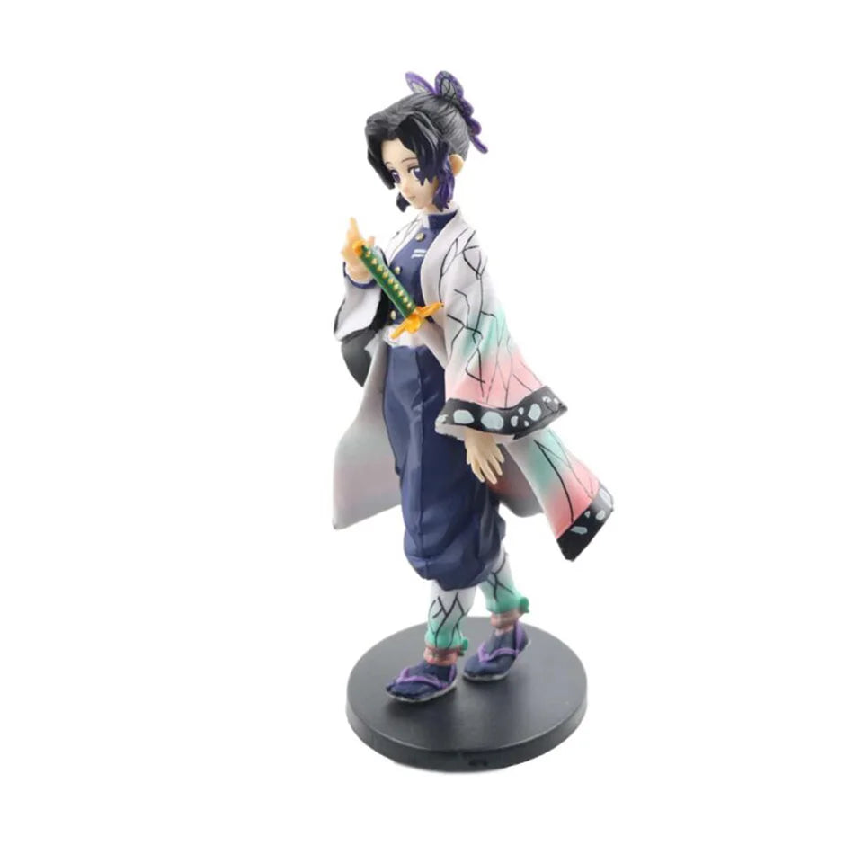 A high-quality Demon Slayer Action Figure PVC model collection featuring Kamado Tanjirou, Agatsuma Zenitsu, and Nezuko in dynamic warrior poses.