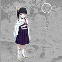 A 6cm Demon Slayer Keychain made of acrylic featuring a cute Tanjiro Kamado anime character, used as a bag pendant or key ring.