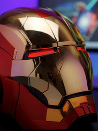 A wearable AutoKing Iron Man Helmet (Mk5) featuring voice-controlled opening face plates and glowing LED eyes for adult cosplay and display.