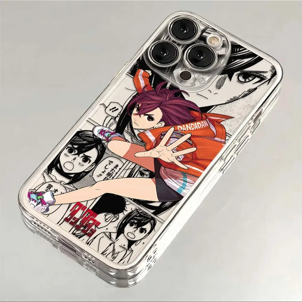A transparent soft TPU Dandadan Phone Case featuring cute anime art of Okarun and Momo Ayase, compatible with Apple iPhone 16e, 15, and 14 Pro Max.