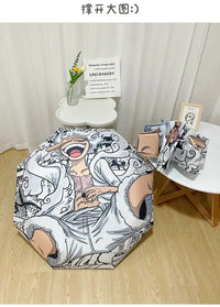 An automatic One Piece Nika Luffy Fold Umbrella with a three-fold design, featuring Gear 5 anime art and black glue sunscreen.
