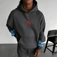 A trendy oversized Demon Slayer Hooded Sweatshirt featuring colorful anime character graphics, designed as casual autumn streetwear for men and women.