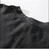 Close-up view of the neckline of the Dark Manga Pattern T-Shirt showcasing its soft fabric and stitching detail.