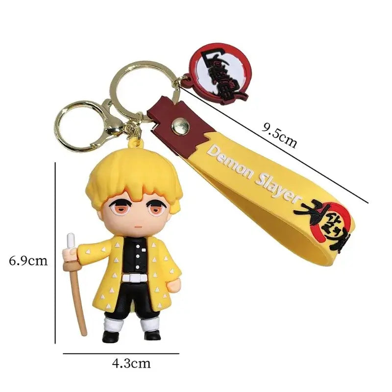 3D Demon Slayer Keychains featuring cute anime character dolls like Tanjiro and Nezuko, used as car ignition accessories and backpack pendants.