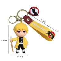 3D Demon Slayer Keychains featuring cute anime character dolls like Tanjiro and Nezuko, used as car ignition accessories and backpack pendants.