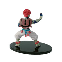 A highly detailed 16cm Demon Slayer Anime Figure made of premium PVC, showcasing Kamado Tanjiro in a dynamic warrior action pose for desktop decoration.